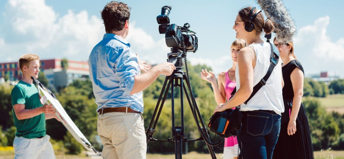 video production team getting ready to record their client